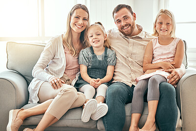 Buy stock photo Happy, love and portrait of family on a sofa in the living room bonding and relaxing together at home. Happiness, Smile and girl children sitting with parents from Australia on floor in the lounge.