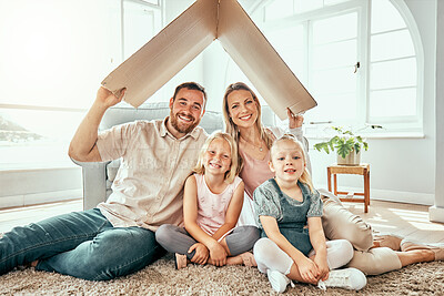 Buy stock photo Happy family, portrait and cardboard roof for real estate, moving in or property investment at new home. Mother, father and kids smile for shelter, apartment or relocation together on house mortgage