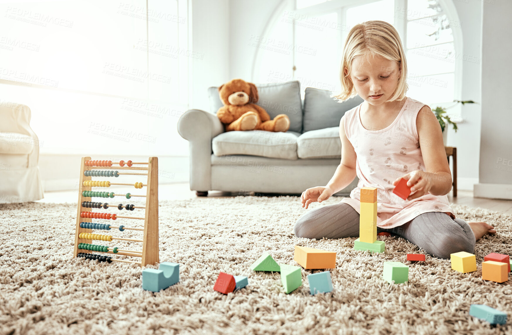 Buy stock photo Girl, child and building blocks on living room carpet for education, learning and puzzle games at home. Kid with toys on floor for development, growth and creative mindset for fun or holiday activity