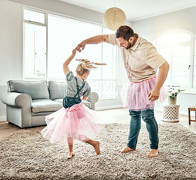 Buy stock photo Family, dance or ballet with a father and daughter together in costume, having fun in the home living room. Love, kids or fantasy and a girl child dancing with her man parent on a carpet in the house