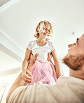 Family, kids and a father carrying his girl daughter in the living room of their home together closeup. Smile, love or children with a happy young kid and her man parent having fun in their house