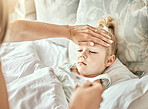 Parent, hands and thermometer with sick kid, fever or flu virus in bed from cold at home. Closeup of mother checking child with illness for temperature or measurement in bedroom or rest at house