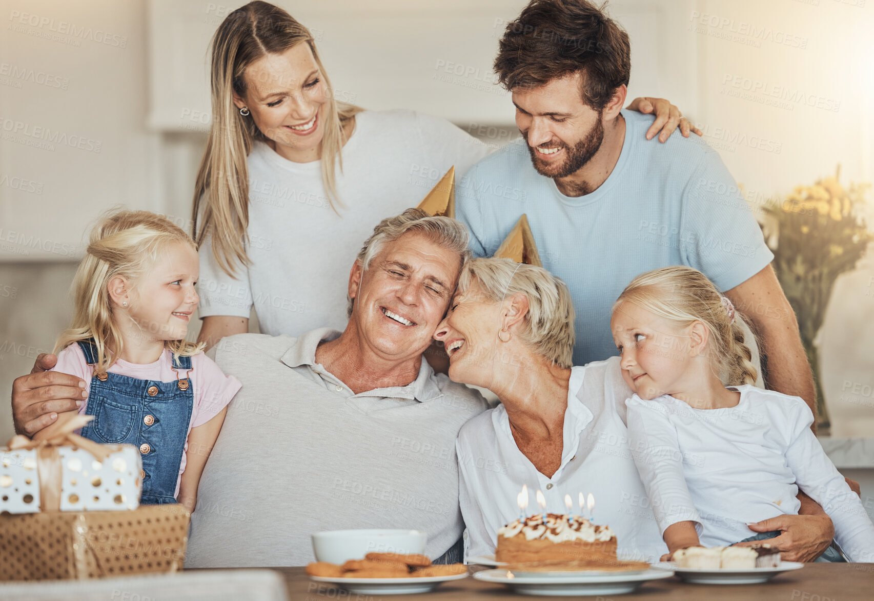 Buy stock photo Birthday, family and grandparents and kids with cake for party, celebration and festive event in home. Happy, smile and elderly mom, dad and parents with dessert, decoration and celebrate for love