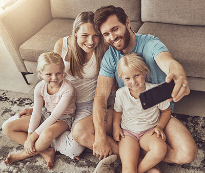 Buy stock photo Selfie, happy family and parents with children on social media picture by living room couch together in the morning. Love, care and mother bonding with father and kids with memory online with smile