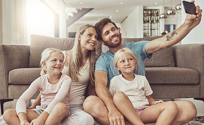 Buy stock photo Selfie, family and parents with children on social media picture by living room couch together in the morning. Love, care and mother bonding with father and kids with memory online with smile