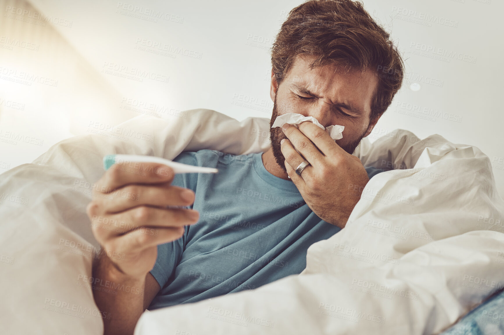 Buy stock photo Man, blowing nose and sick with allergies, thermometer to check for fever, virus and bacteria with health fail at home. Toilet paper, healthcare crisis with medical condition and monitor temperature