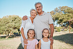 Nature, portrait and happy family, children and grandparents enjoy time together, outdoor wellness or park grass field. Smile, love and relax grandma, grandpa or people bonding with kids in Australia