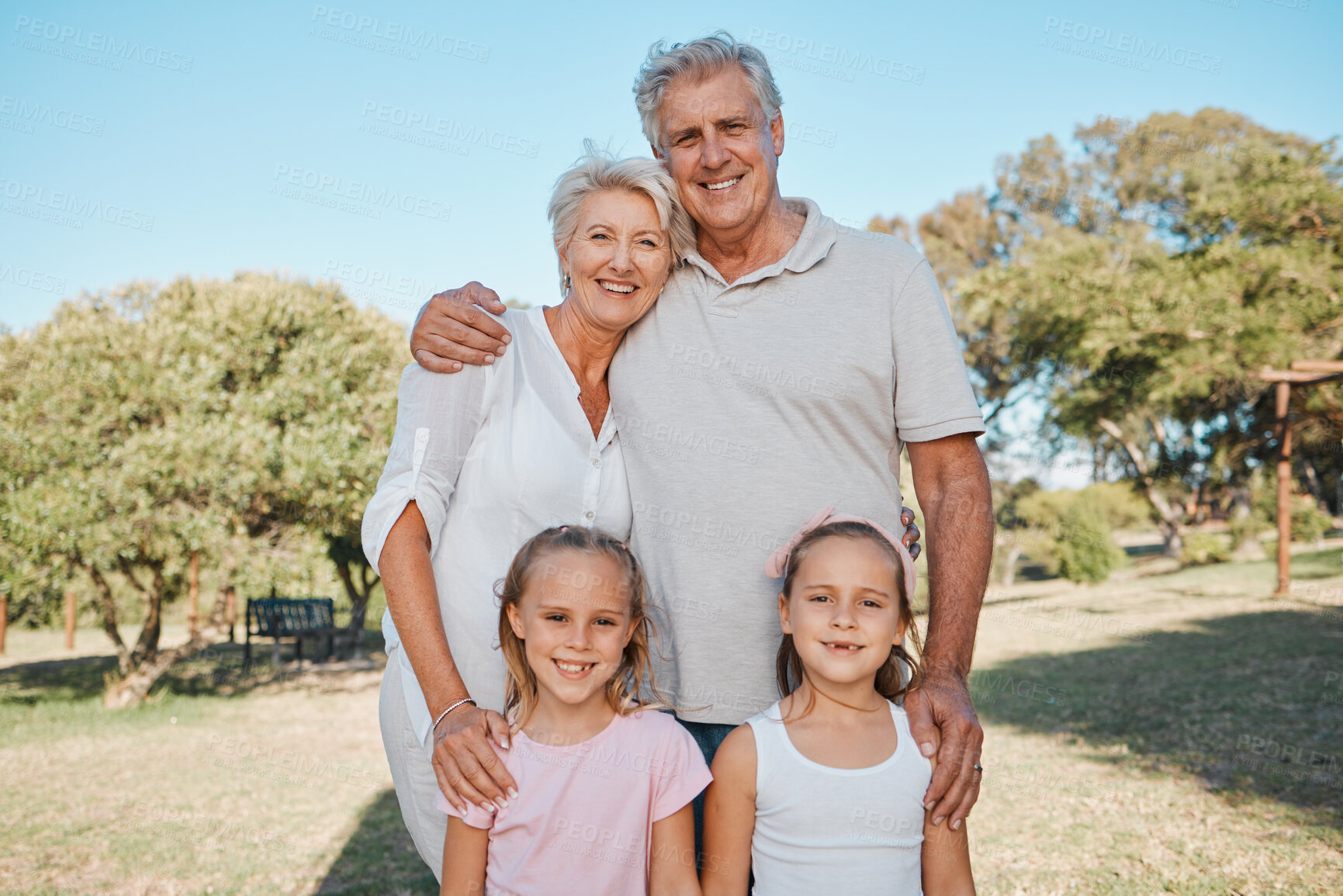 Buy stock photo Nature, portrait and happy family, children and grandparents enjoy time together, outdoor wellness or park grass field. Smile, love and relax grandma, grandpa or people bonding with kids in Australia