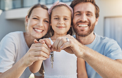 Buy stock photo Home keys, parents or portrait of happy family with child or smile in new house, apartment or real estate. Hands, excited mother or proud father with a girl or kid moving into property investment