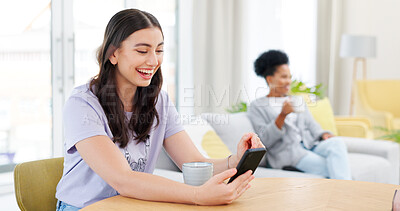 Buy stock photo Phone, happy and young woman in the living room networking on social media or mobile app. Smile, technology and female person scroll on the internet with cellphone by table in modern apartment.