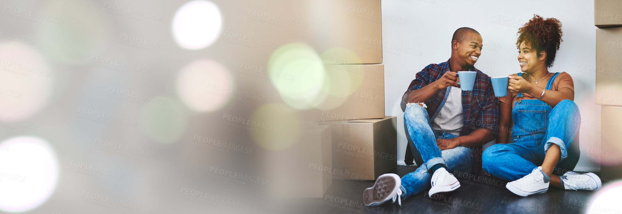 Buy stock photo Coffee, mockup or happy couple with boxes in new home for investment in property or real estate. Smile, bokeh or excited black man with a biracial woman in a house with loan success, goal or security