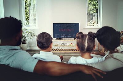 Buy stock photo Back, family and watching tv for government announcement with people in their home during an emergency broadcast. Mother, father and children in the living room for fear propaganda in a disaster