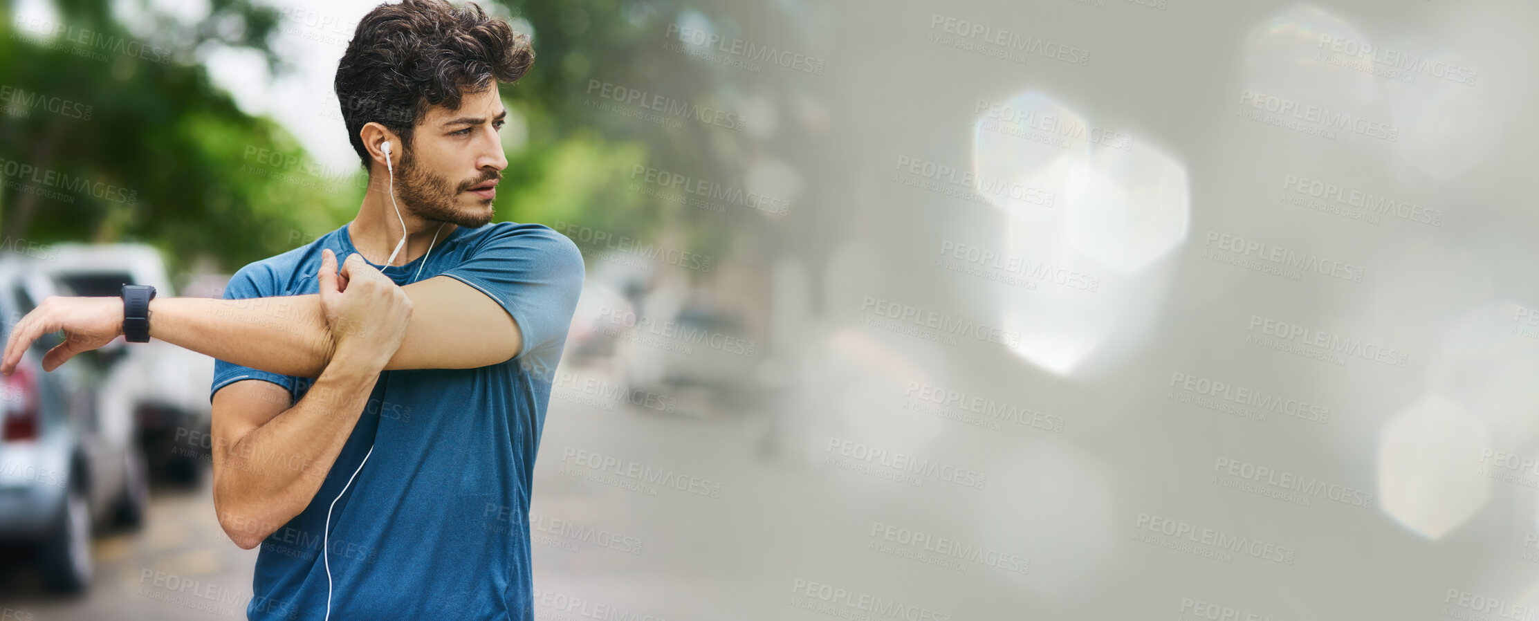 Buy stock photo Fitness, stretching and man in a road with music earphones for training, running or cardio with bokeh. Arm, stretch and male runner in a street for body warm up, workout or exercise with podcast