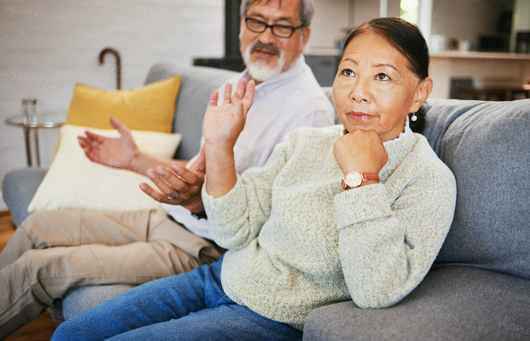 Buy stock photo Frustrated couple, argument and fight on sofa in conflict, divorce or disagreement in living room at home. Unhappy man and woman ignore in toxic relationship, marriage or breakup on couch at house