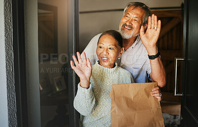 Buy stock photo Mature couple, wave and delivery of package in home, commerce or cargo service at door. Asian man, happy woman and goodbye hand sign for communication, thank you for shipping parcel or smile together