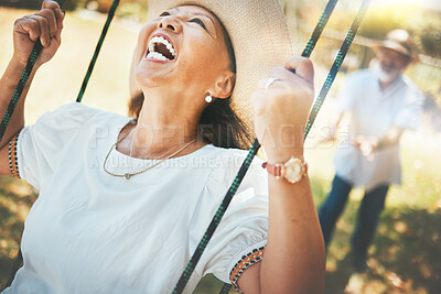 Buy stock photo Woman, laugh and fun on swing in retirement, playful and energy in summer vacation for quality time. Happy old people, support and love in relationship, funny and excited for silly, goofy and holiday