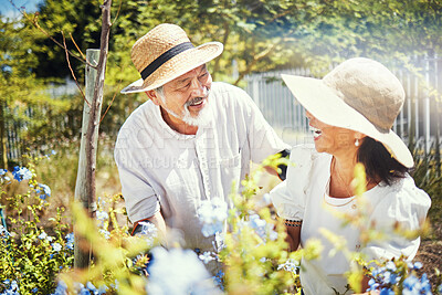 Buy stock photo Couple, gardening and happy in nature for retirement, love and bonding with smile. Senior people, quality time and care in marriage, garden and hat for protection from sun, hobby in spring in outdoor