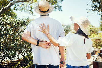 Buy stock photo Senior couple, view and back in garden with smile, summer sunshine and bonding in retirement. Happy elderly man, old woman and outdoor with embrace, love and care in backyard to relax in Jakarta