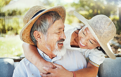 Buy stock photo Senior couple, outdoor and hug with smile, retired and happiness for love, marriage and bonding together. Asian man, woman and enjoy or relax in nature, embrace and romantic in home, patio and garden