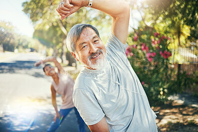 Man, smile and stretching arms for run outside, earphones and listening to music, audio and song for motivation. Healthy couple, cardio and training in retirement, workout and exercise for fitness