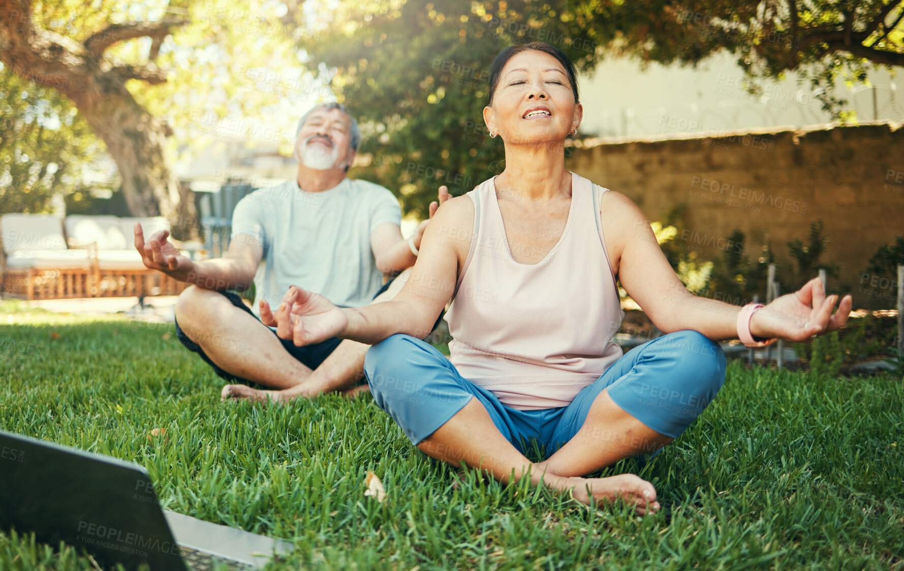 Buy stock photo Couple, yoga and lotus meditation with laptop in nature at park for mindfulness, peace and calm. Mature man, woman and yogi on computer for online lesson on video, wellness and zen for body health