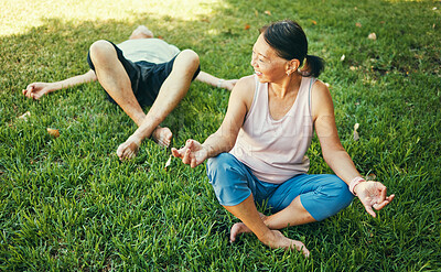 Buy stock photo Happy couple, yoga and lotus meditation on grass at park for mindfulness, peace and calm. Mature man, funny woman and meditate in holistic exercise, wellness or zen to relax for body health outdoor