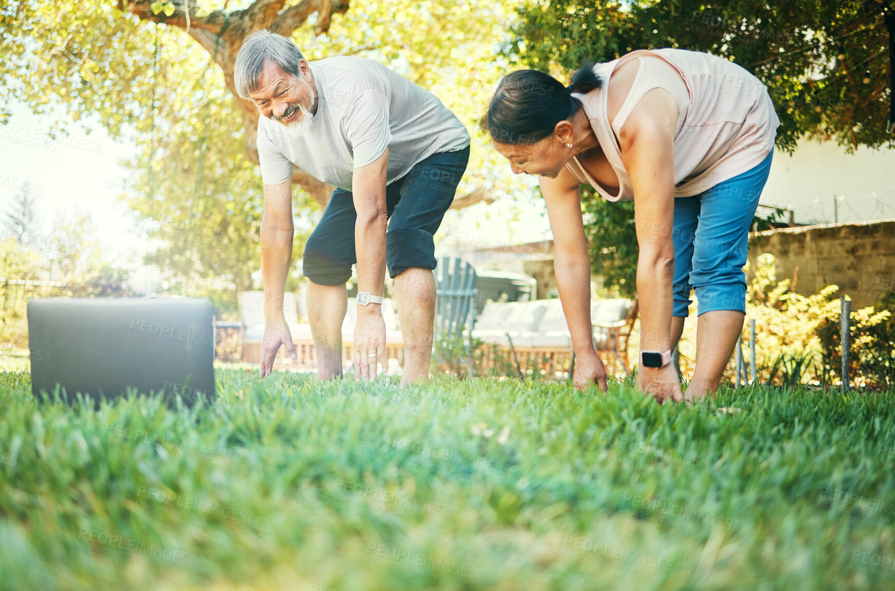 Buy stock photo Yoga, stretching and mature couple on laptop outdoor for exercise, flexible and body health. Pilates, smile and Asian man and woman at park on computer for online class, fitness or wellness together