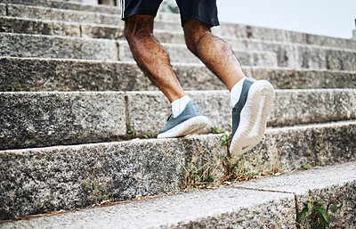 Buy stock photo Man, legs and running on stairs in fitness for workout, training or outdoor cardio exercise. Closeup of male person, shoes or feet on steps for sports, health or wellness in an urban town or city