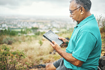 Buy stock photo Senior man, bible and reading in nature, thinking or peace for mindfulness, faith or spiritual knowledge. Mature person, Christian book and ideas with gratitude, religion or connection to holy spirit