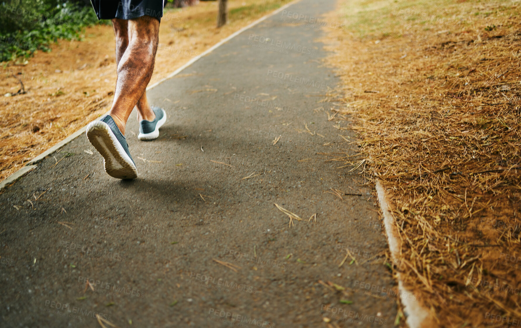 Buy stock photo Man, fitness and legs on road for running or workout in outdoor exercise or training in nature. Closeup of male person, athlete or runner on path, sidewalk or asphalt for cardio, walking or wellness 