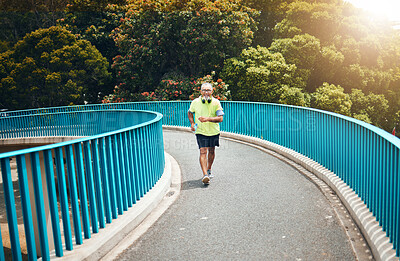 Buy stock photo Old man on bridge, speed walking for fitness and cardio,  training or running with wellness and vitality. Runner in street, performance and challenge with exercise, health and workout in retirement