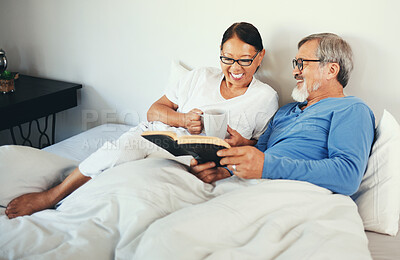 Buy stock photo Bible, mature or happy couple reading book for prayer, support or hope in home to worship together. Bed, Asian man or senior woman learning or studying God for grace in religion with love or coffee 