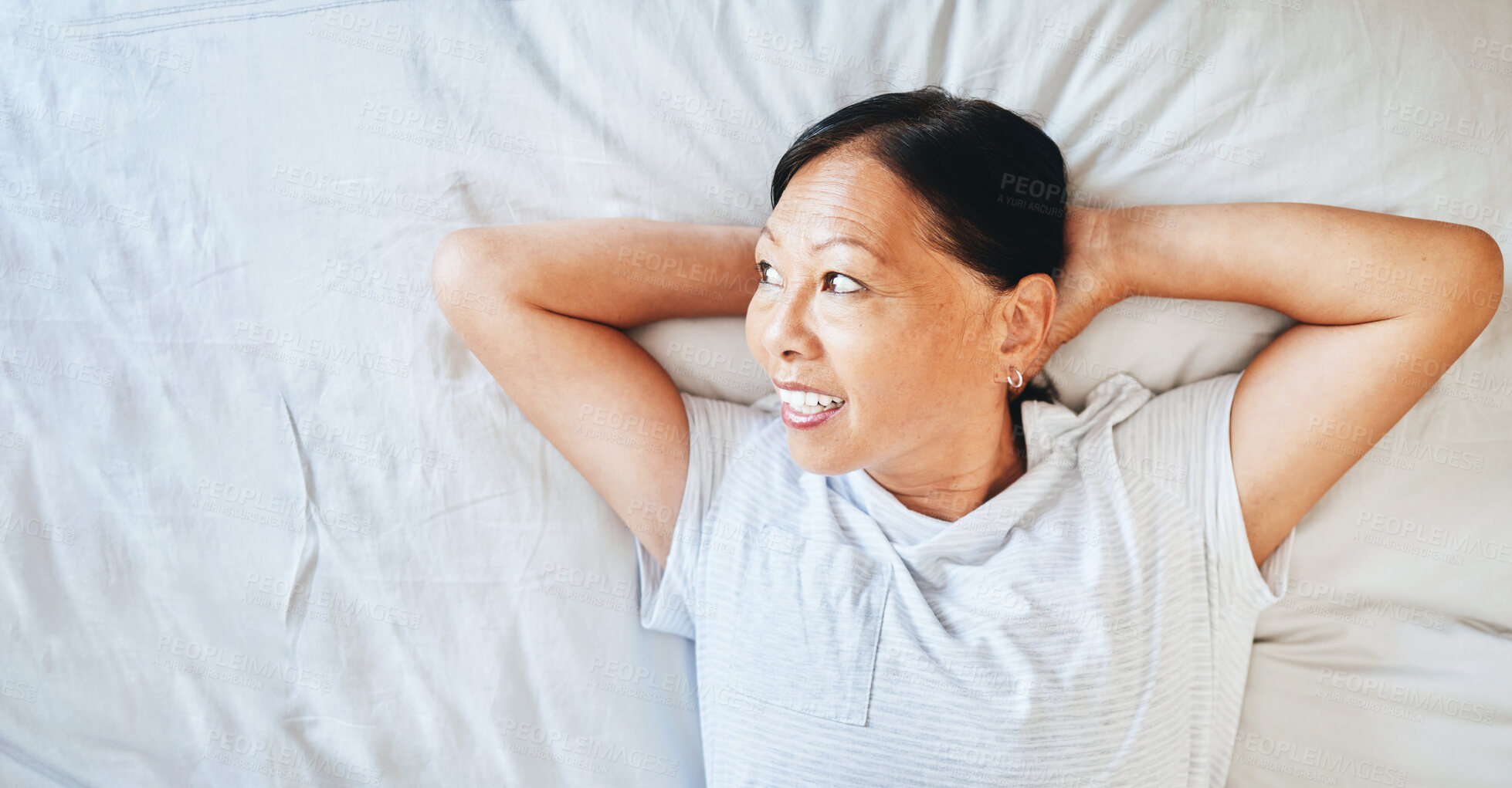 Buy stock photo Bed, thinking and happy mature woman sleeping, tired or nap for stress relief, morning wellness or retirement rest. Top view, mockup space and Japanese person relax, daydream or smile in home bedroom