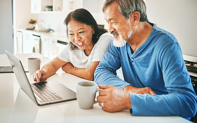 Buy stock photo Home, typing and senior couple with a laptop, conversation and search internet with website info, network and connection. Kitchen, elderly man and old woman with a pc, email notification and talking