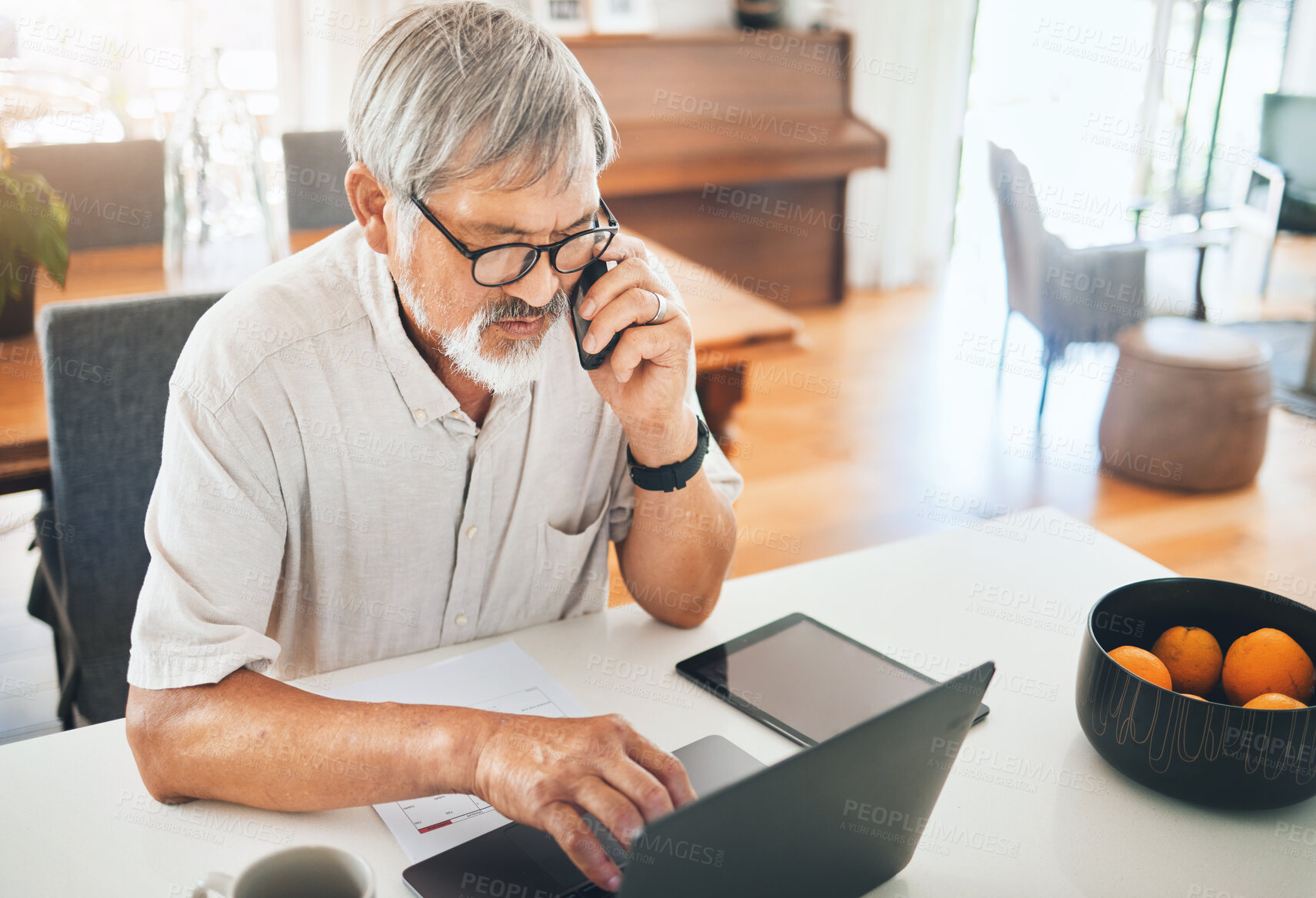 Buy stock photo Business man, home phone call and laptop for planning, online investment and communication on technology. Senior person, CEO or entrepreneur typing on computer, talking on mobile or remote networking