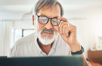 Buy stock photo Senior man, glasses and headache on computer for debt, bankruptcy or stock market crash at home. Sad asian person or trader with pain, fatigue or depression reading bad news or trading fail on laptop