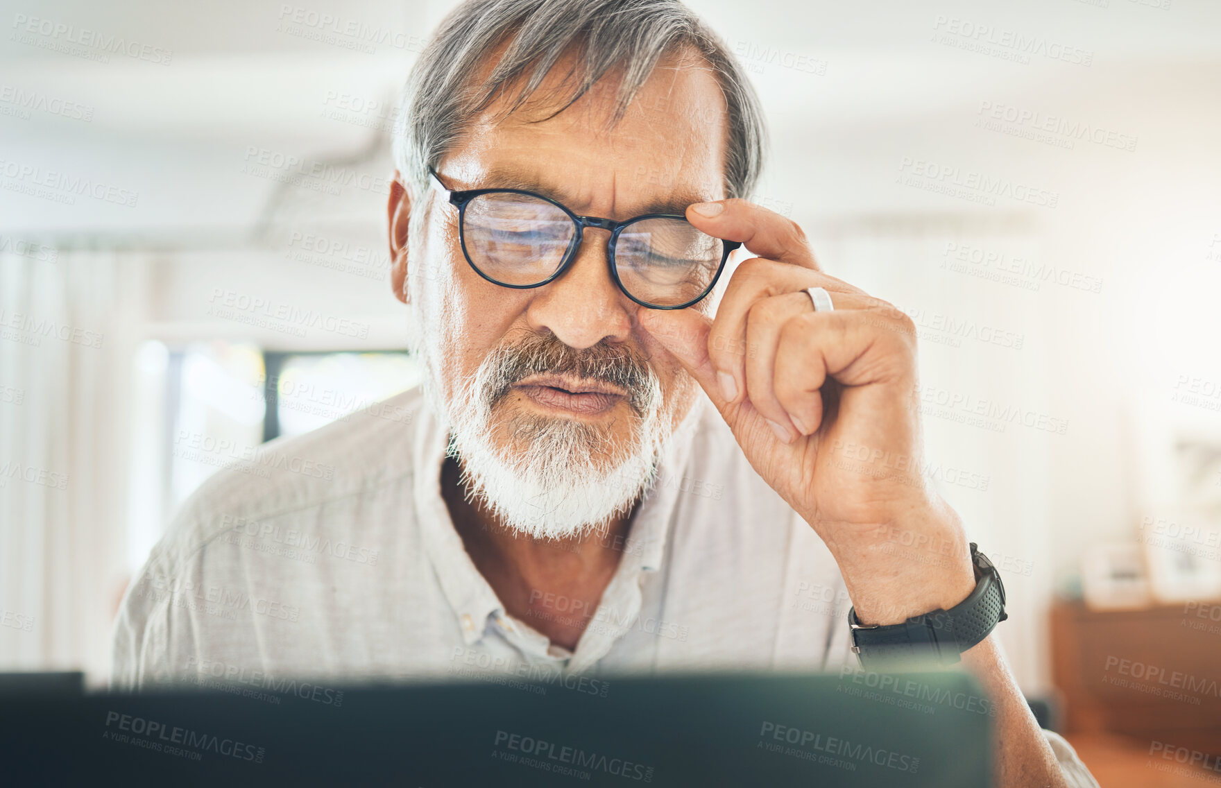 Buy stock photo Senior man, glasses and headache on computer for debt, bankruptcy or stock market crash at home. Sad asian person or trader with pain, fatigue or depression reading bad news or trading fail on laptop