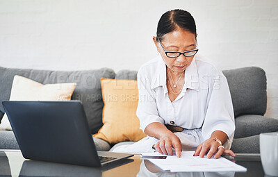 Buy stock photo Mature woman, documents and credit card for home budget, investment and asset management on her sofa. Investor or executive on computer for work from home revenue, bank paperwork or loan application