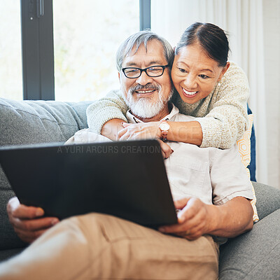 Buy stock photo Laptop, smile and senior couple on a sofa watching movie, show or film together in living room. Happy, technology and elderly man and woman in retirement streaming a video on computer at modern home.