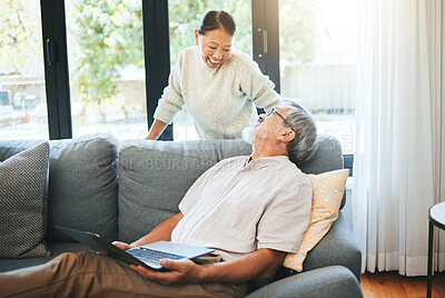 Buy stock photo Laptop, smile and mature couple on sofa in home, love or bonding together. Computer, happy man and Asian woman in living room on website, online social media or communication for healthy relationship