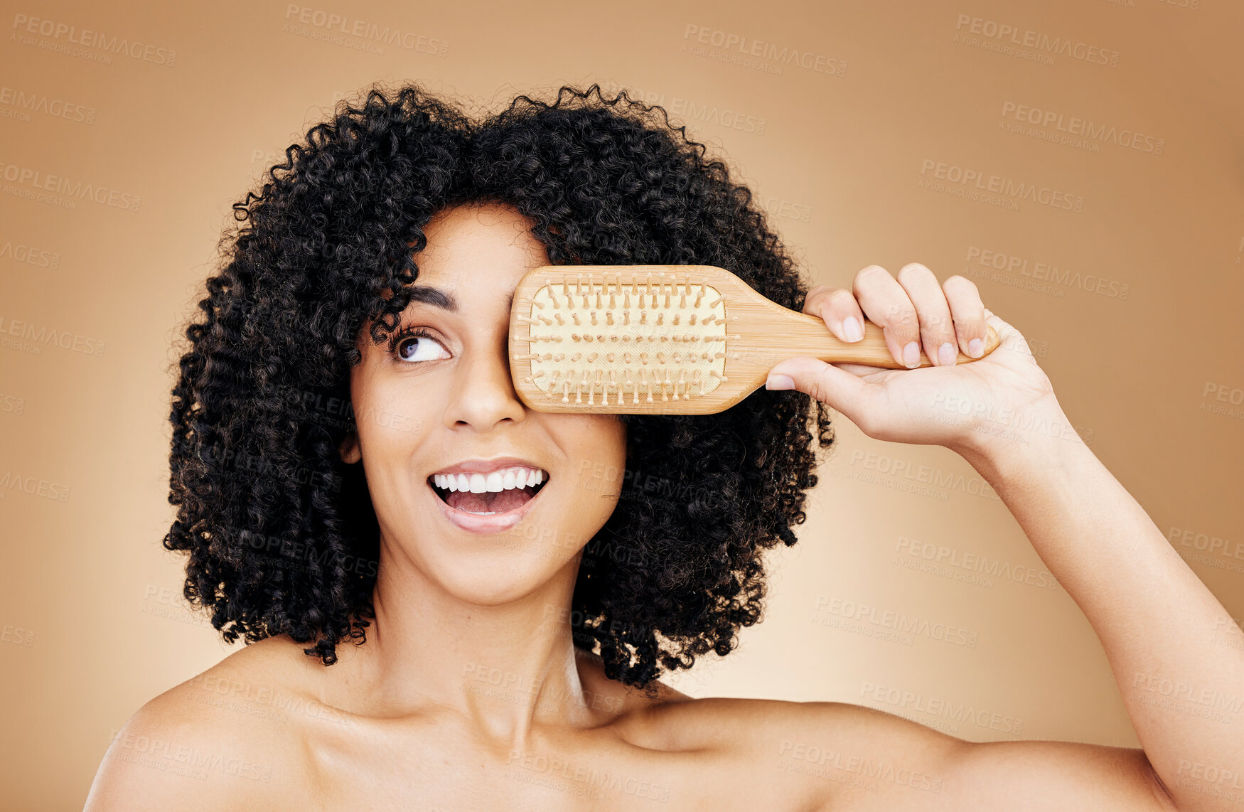 Buy stock photo Hair, beauty and woman with afro brush for style isolated in a studio brown background for wellness and skincare. Comb, natural and young person with cosmetic aesthetic in Brazil hairdresser