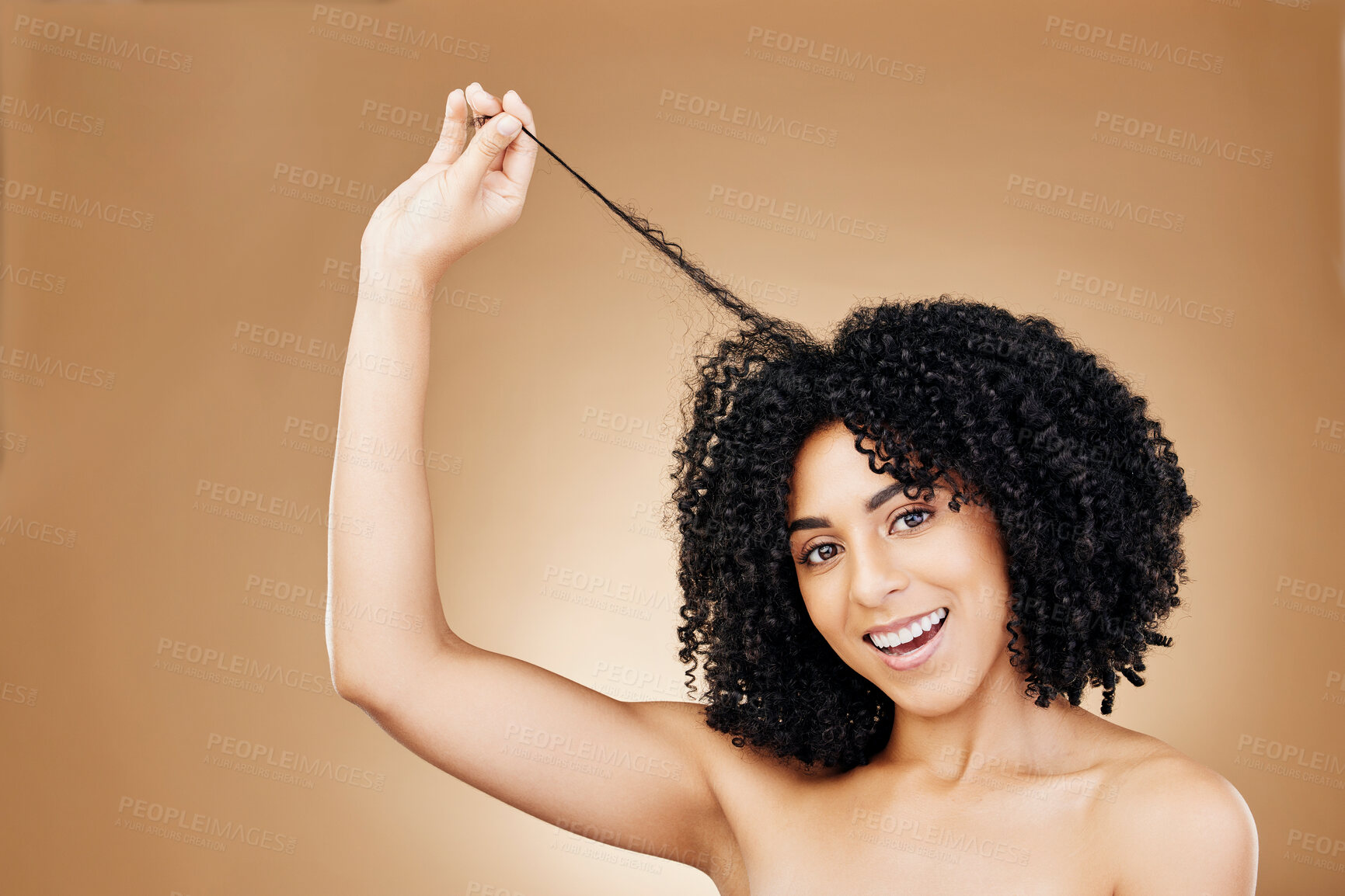 Buy stock photo Woman, portrait and hair, curly with shine and beauty, smile for salon treatment and strong texture on studio background. Face, skin and glow with growth, haircare and cosmetology with model and afro