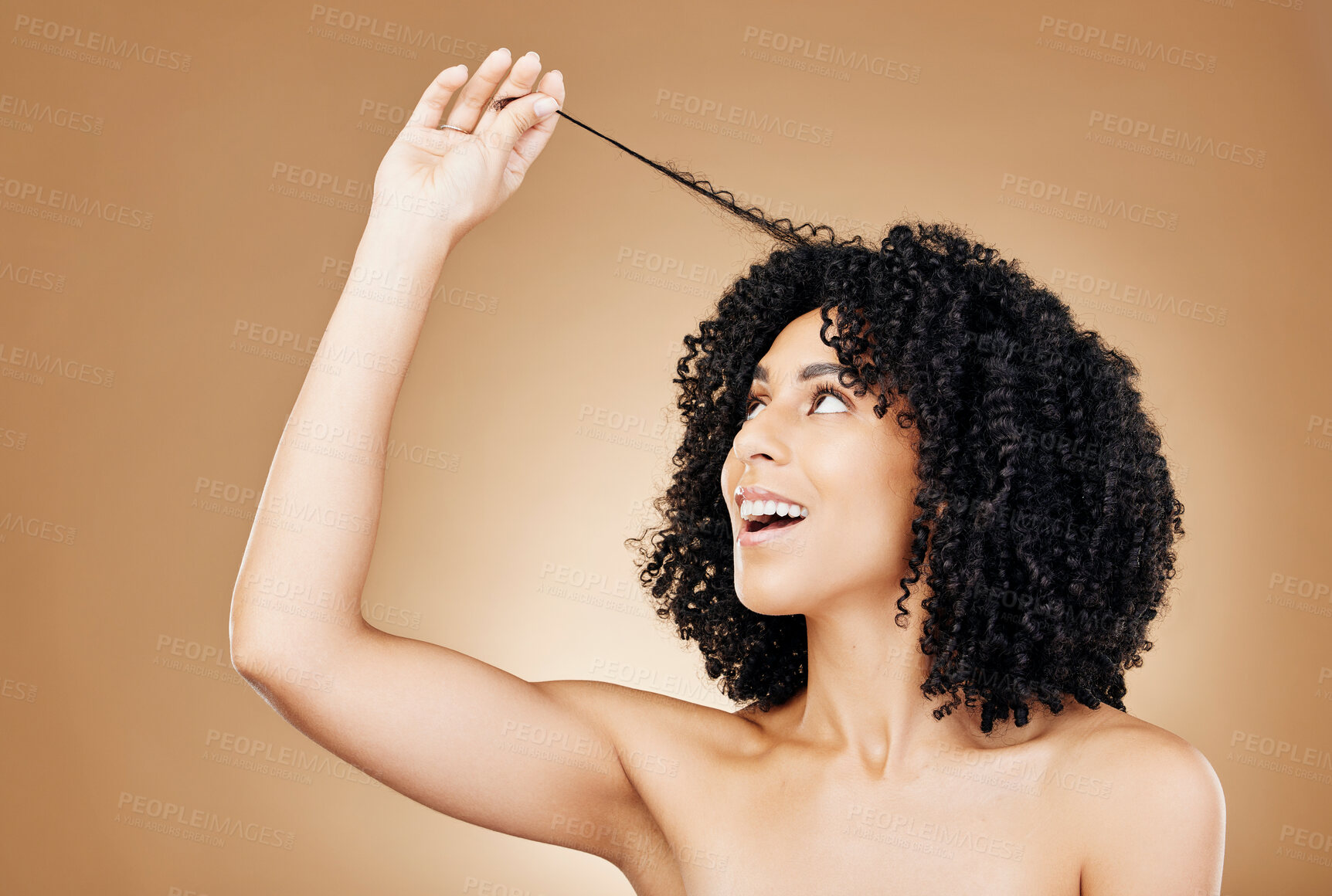 Buy stock photo Hair, curls and growth with woman and beauty, shine and salon treatment with natural cosmetics on brown background. Wellness, haircare and texture with happy model, studio with curly afro hairstyle