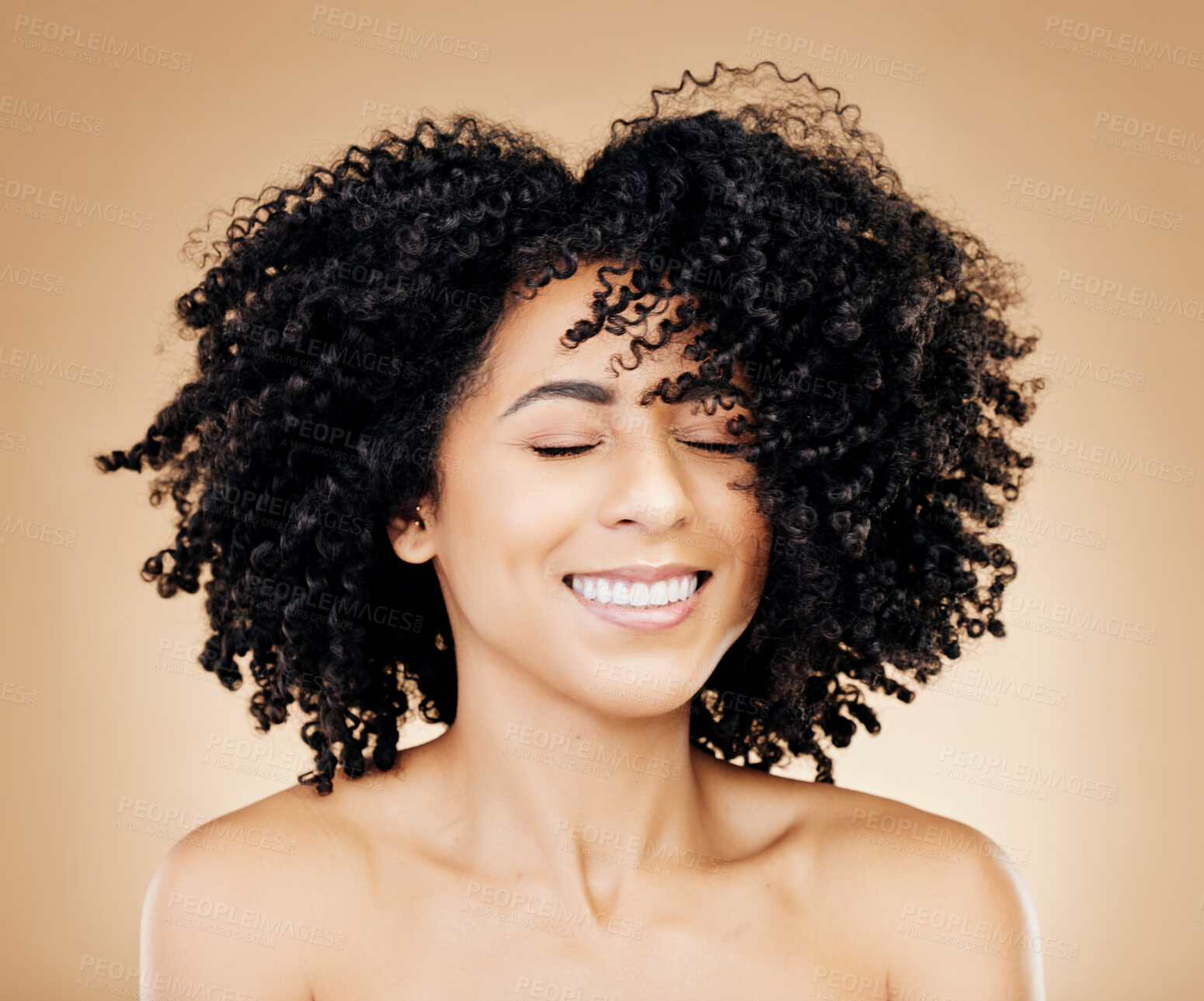 Buy stock photo Woman, curly or wind in afro hair for fun on studio background in healthy hairstyle growth, texture or frizz treatment success. African beauty model, shake or change by shampoo transformation results