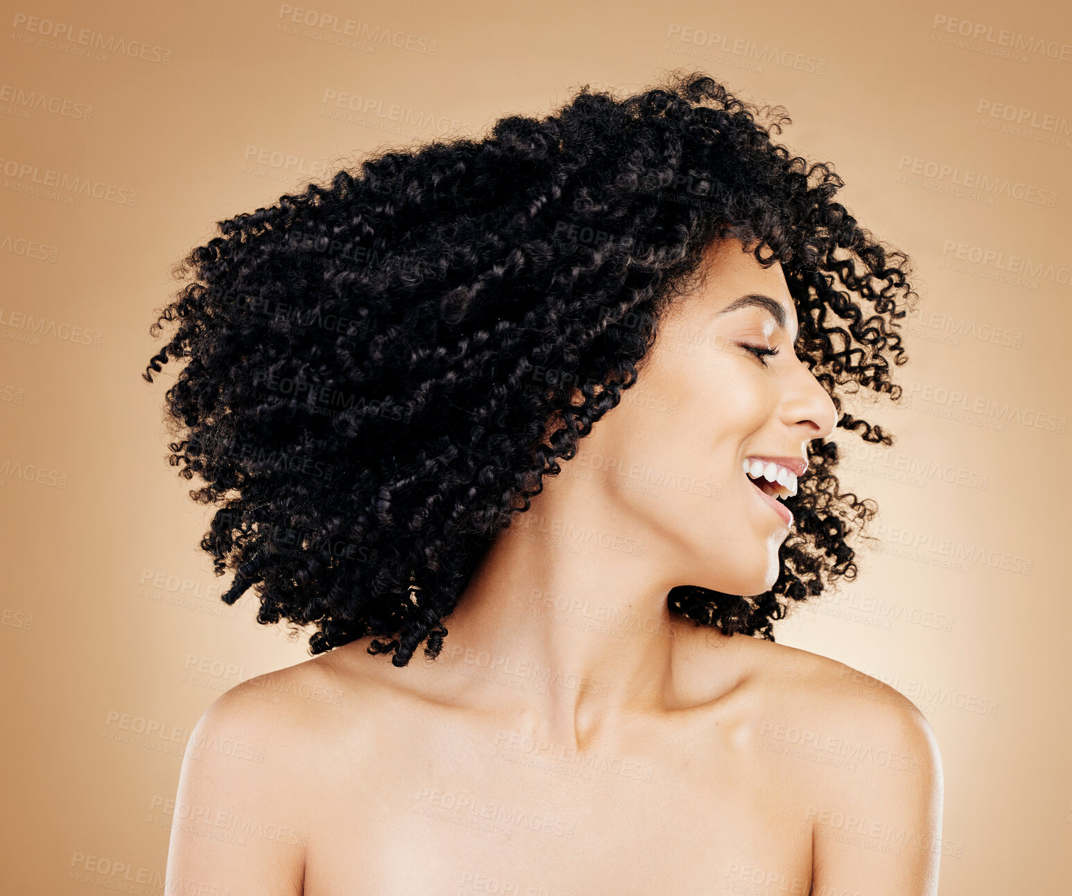 Buy stock photo Happy woman, curly and hair shake afro for fun on studio background in healthy hairstyle growth, texture or frizz treatment. African beauty model, energy and change by shampoo transformation results