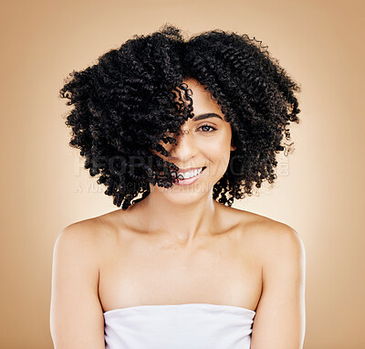 Buy stock photo Hair, curls and portrait of woman, beauty and treatment for shine, cosmetic care and smile on studio background. Wellness, haircare and growth with strong texture and shake locks, volume and afro