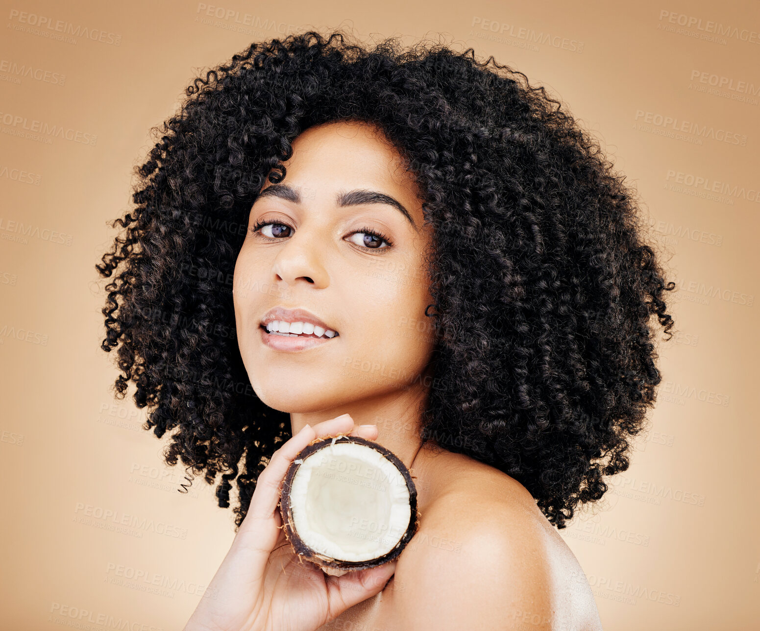 Buy stock photo Studio woman, beauty portrait and coconut skin detox, vegan nutrients or organic facial cosmetics, antioxidants or self care. Clean face, fruit benefits and model skincare product on brown background