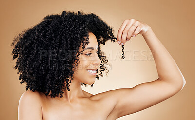 Buy stock photo Hair, growth and woman with beauty and curls, smile with natural cosmetics and shine isolated on studio background. Texture, curly hairstyle with haircare and transformation, skin and cosmetology