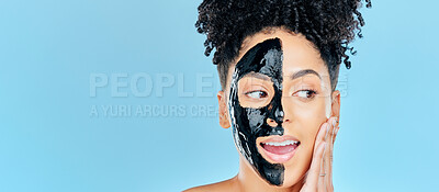 Buy stock photo Mockup, charcoal mask and face of woman for facial treatment, anti aging detox and wellness in studio. Beauty, salon and person for healthy skin, cosmetics and grooming on blue background space