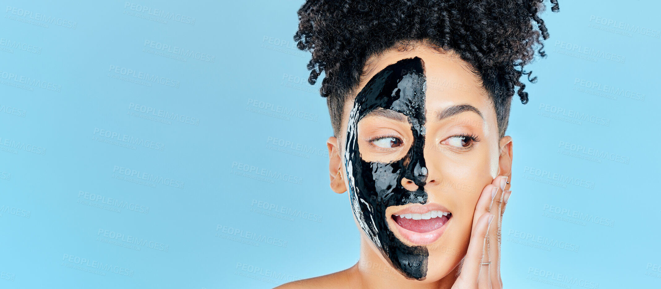 Buy stock photo Mockup, charcoal mask and face of woman for facial treatment, anti aging detox and wellness in studio. Beauty, salon and person for healthy skin, cosmetics and grooming on blue background space